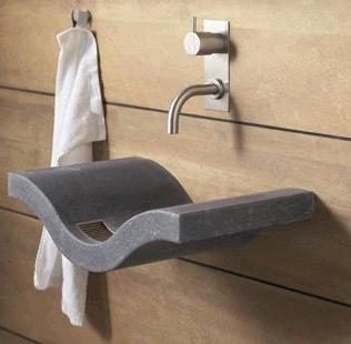 Limestone wall-mount lavatory by B Dutch